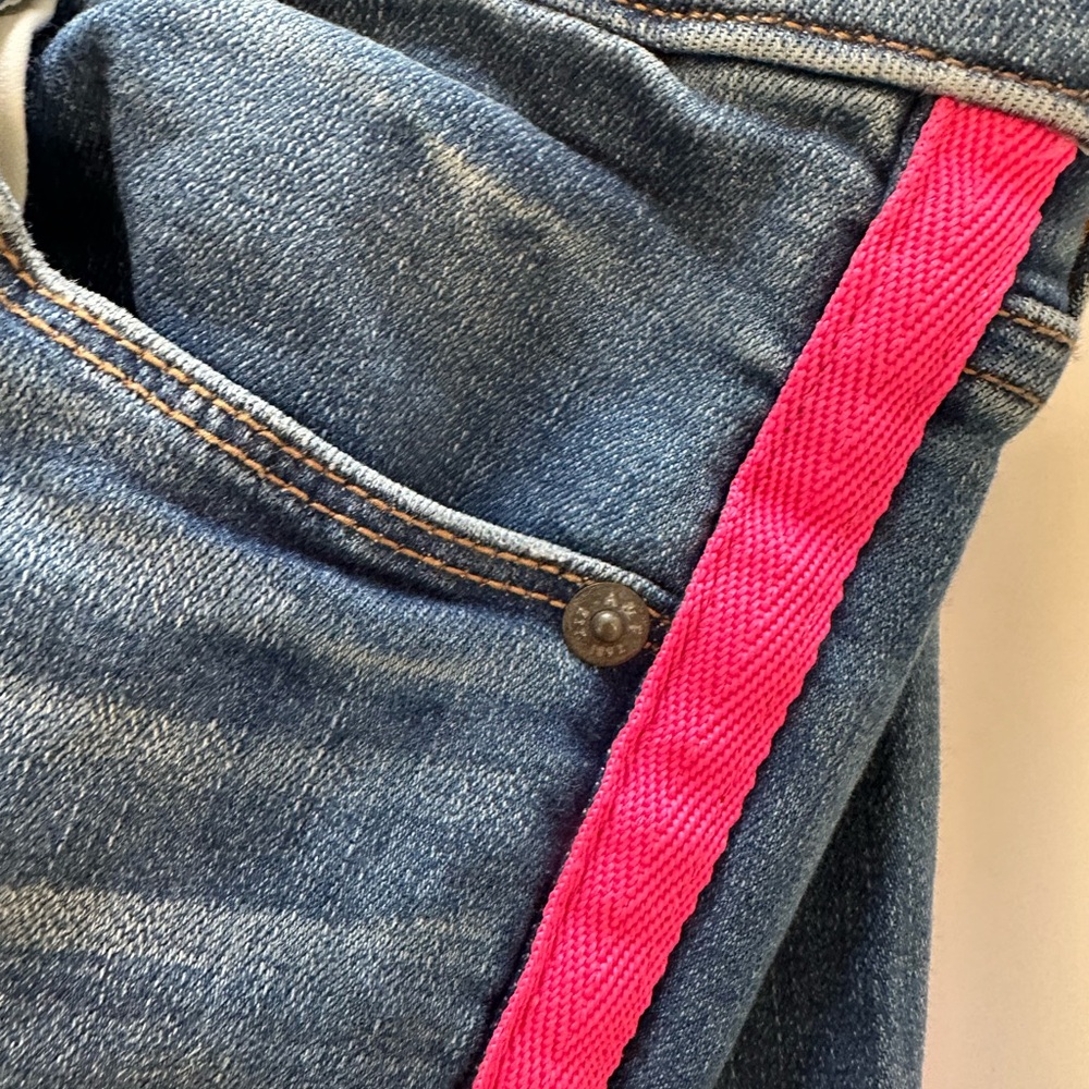 Stylish Blue Jeans with Pink Accents